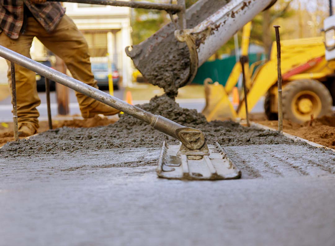 Worker working for concrete pavement for ground construction